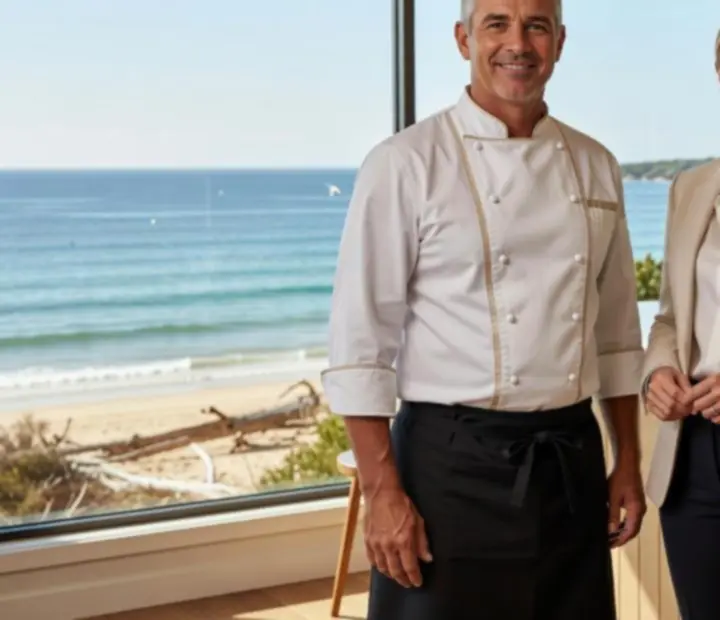 Portrait of the head chef and venue manager of Potand Peppeer standing in front of the open kitchen